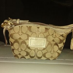 Coach Brown Clutch with Signature Design